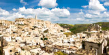 Fototapeta Miasto - Watercolor drawing of Aerial panoramic view of historical centre Sasso Caveoso of old ancient town Sassi di Matera with rock cave houses, blue sky white clouds, Basilicata, Southern Italy