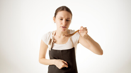 Canvas Print - girl cook trying food