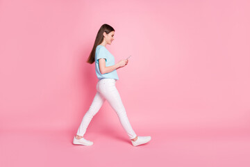 Sticker - Full length profile side photo of girl use cellphone go copyspace isolated pastel color background