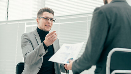 Wall Mural - close up. business colleagues discussing new ideas.