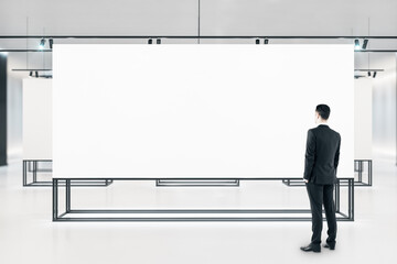 Aufkleber - Businessman standing gallery interior