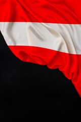 vertical color national flag of modern state of Austria, beautiful silk, black blank form, concept of tourism, economy, politics, emigration, independence day, copy space, template