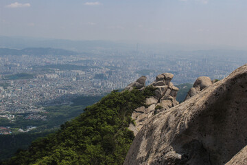 City view from the high mountain. One-day hiking in megapolice