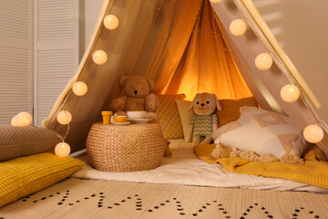 Sticker - Play tent with toys and pillows indoors, closeup. Modern children's room interior