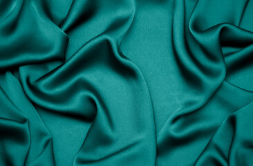 Tidewater green color silk draped fabric background