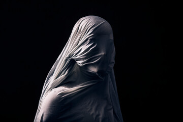 Wall Mural - Portrait of a scary ghost isolated on black background