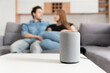 © Proxima Studio - Couple talking command to smart speaker