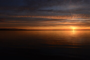 Wall Mural - Beautiful view of brightly lit sunset in sky
