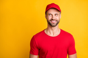 Sticker - Photo of positive young guy white shiny smile look empty space wear red t-shirt cap isolated yellow color background