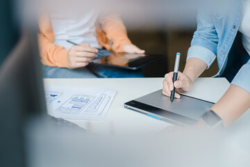 Wall Mural - creative web designer planning application and developing template layout, framework for mobile phon