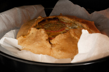 Ready to eat salt pie with vegetables, traditional homemade meal