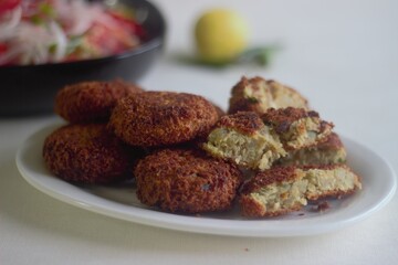 Wall Mural - Kerala style deep fried chicken cutlets served with onion tomato salad