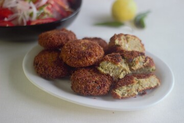 Wall Mural - Kerala style deep fried chicken cutlets served with onion tomato salad