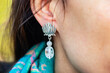 © marbenzu - Closeup of female ear wearing beautiful earring