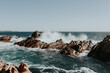 © Cedric Tang/Austockphoto - Waves crashing on rock formations just off coastline