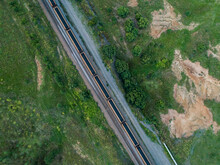 Coal Train Seen From Drone On Railway Track Through Green Landscape In Hunter Valley