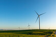 © Rosalie Dibben/Austockphoto - wind turbines on rolling farmland