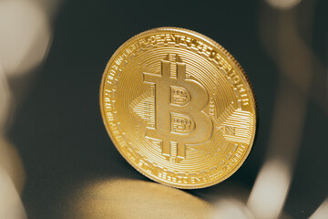 Wall Mural - Bitcoins and new virtual money. Gold coin with B.Mining icon or blockchain technology