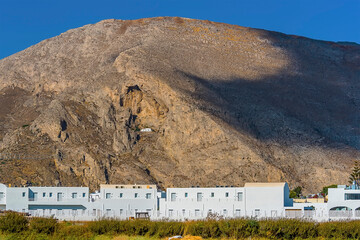 Wall Mural - A view from Perissa, Santorini towards Mount Taygetus in summertime