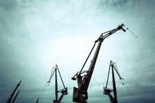 Silhouettes Of Industrial Cranes In Gdansk  Shipyard