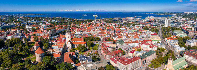 Wall Mural - Amazing aerial drone shot of old town of Tallinn, Estonia at sunset