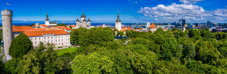 Wall Mural - amazing aerial drone shot of old town of tallinn, estonia at sunset