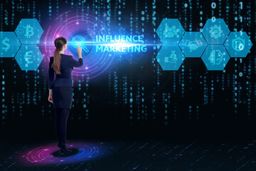 Business, Technology, Internet and network concept. Young businessman working on a virtual screen of the future and sees the inscription: Influence marketing