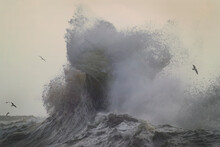 Stormy And Powerful Waves Crash Against The Cliffs Of Cape Disappointment