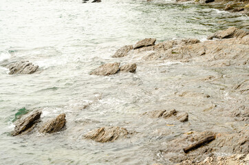 sea waves and rock coast, seascape in Thailand