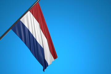 Wall Mural - 3D illustration of the national flag of Netherlands on a metal flagpole fluttering against the blue sky.Country symbol.