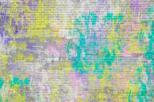Multi-colored Brick Wall. Bright Green, Purple, Yellow Paint On Brick Texture.