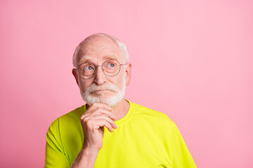 Sticker - Close up portrait of handsome person arm on chin look empty space wear lime isolated on pink color background