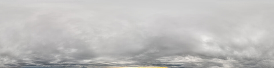 Wall Mural - sky panorama on overcast rainy day with low clouds in seamless spherical equirectangular format with complete zenith for use in 3D graphics, game and for aerial drone 360 degree panorama as a sky dome