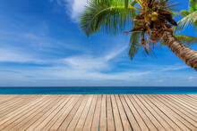 Tropical Sunny Beach With Wooden Floor, Palm Trees And The Turquoise Sea On Paradise Island.