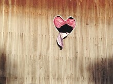 Heart Shape Hole On Wooden Wall