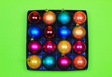 Multicolor Christmas Balls On Green Background