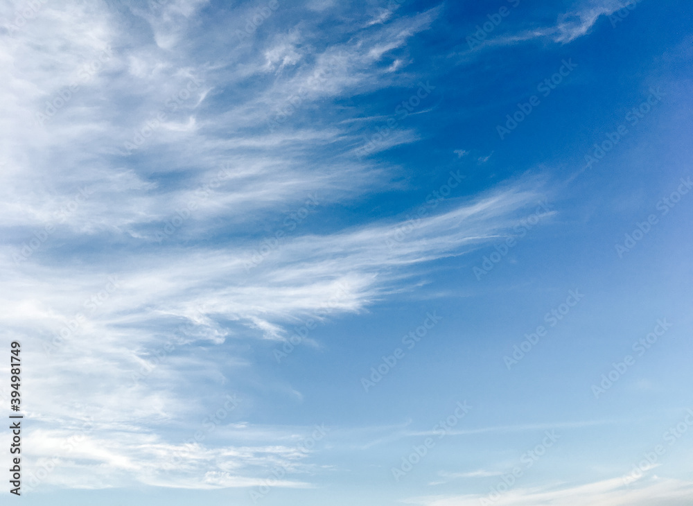 Blue sky with beautiful and fluffy white clouds Stock Photo | Adobe Stock