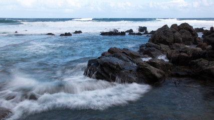 Wall Mural - water and rocks in the atlantic