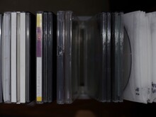 Directly Above Shot Of Compact Discs In Container