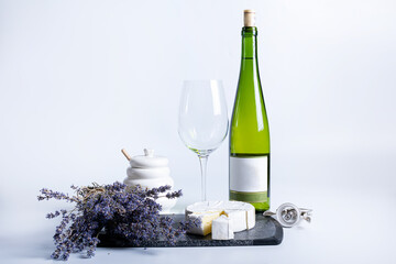 Wine bottle and two wine glasses. Wine bottle against a white background