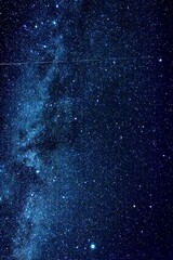 Wall Mural - vertical photo of amazing clear night sky with milky way and huge amount of stars.