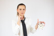 © Danko - Business caucasian woman thinking on a white background