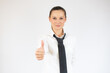 © Danko - Happy smiling business woman with thumb up gesture, isolated on white background