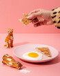 Breakfast made of coffee, eggs, bread and a tiger