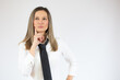 © Danko - Business caucasian woman holding tablet thinking on a white background