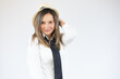 © Danko - Portrait of a business woman wearing straw hat over white background.