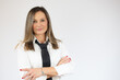 © Danko - Young business woman over isolated white background looking to the camera.