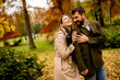 © BGStock72 - Young couple walking in the autumn park
