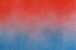 © curto - .spray paint gradient from red to blue on a white paper background