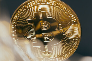 Wall Mural - Bitcoins and new virtual money. Gold coin with B.Mining icon or blockchain technology
